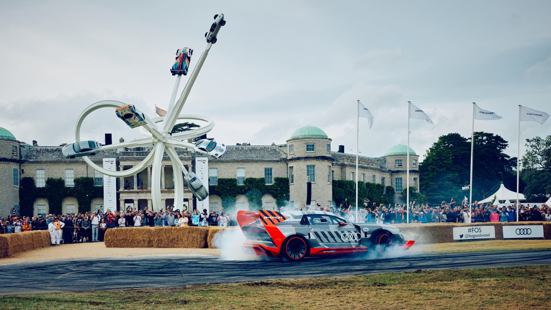 The Audi S1 Hoonitron in front of Goodwood House.